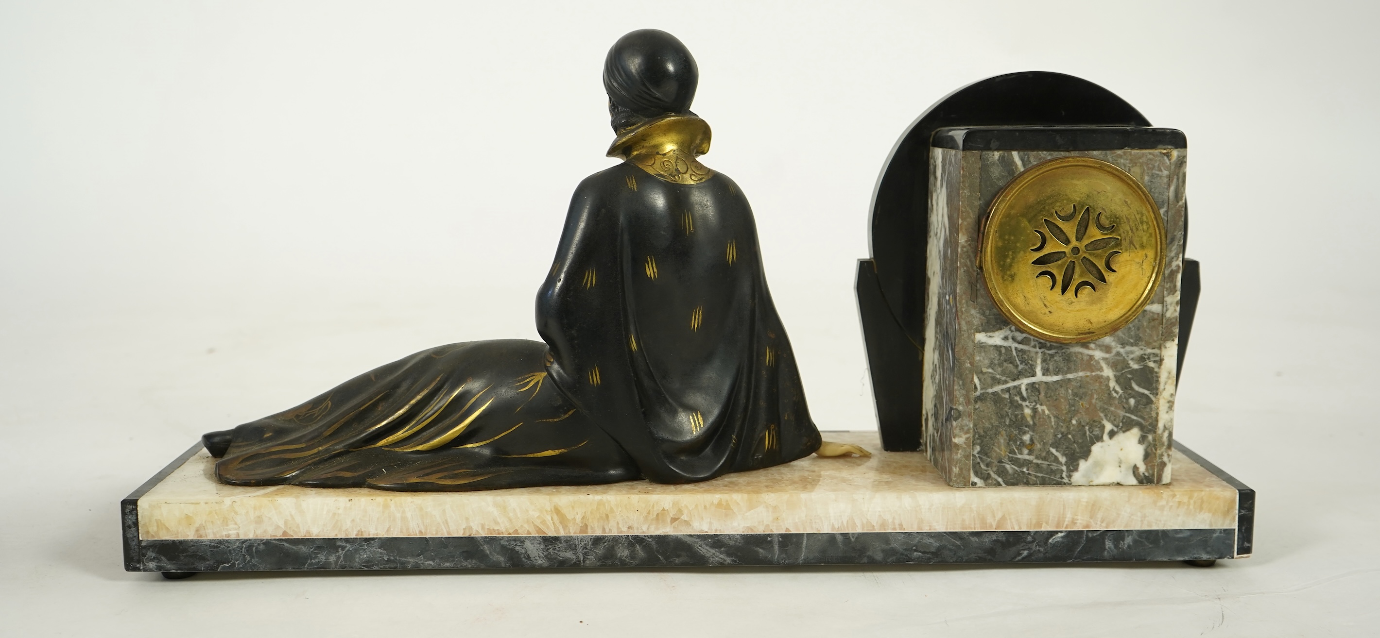 Attributed to Uriano (Ugo Cipriani, Italian, 1897-1960), a French Art Deco marble clock garniture